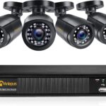 Conjunto fotográfico que muestra cuatro cámaras tipo bala negras con anillos de LEDs visibles para visión nocturna y un videograbador compacto negro, Anlapus 1080P Kit de Cámaras Seguridad 8CH H.265+ Videograbador DVR con 4 Cámara de Vigilancia Exterior, sin Disco Duro, Visión Nocturna, Alarma de Movimiento, presentado sobre fondo blanco.
