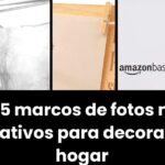 Collage visual que muestra varios marcos de fotos de madera y fotografías sujetas con pinzas, un recuadro negro central con el texto blanco "Los 5 marcos de fotos más creativos para decorar tu hogar", el logotipo de AmazonBasics y el producto ZGSZ Marco de Fotos Cámara Oculta, Mini WiFi Cámara Oculta WiFi HD 1080P Cámara Espía, 2 en 1 Marco de Fotos Cámara Espía con Detección de Movimiento, Grabación en Bucle y App Vista Remota integrado en la composición.